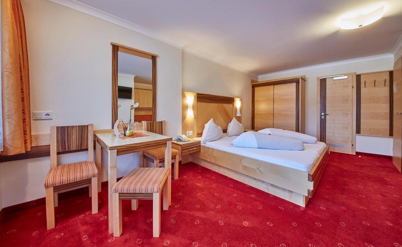 Apart-Hotel Forellenhof Saalbach-Hinterglemm Szoba fotó